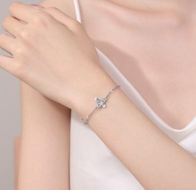 Sterling Silver Moissanite Four Petal Flower Station Bracelet, detail view 3