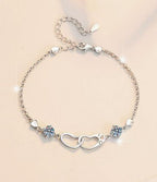 Sterling Silver Moissanite Twin Flower Heart Link Bracelet, detail view 1