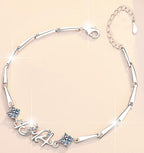 Sterling Silver Moissanite Number and Flower Station Bracelet, detail view 1